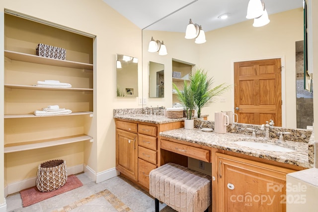 830 Fortescue Rd, Zirconia, NC 28790 - bathroom with double vanity, baseboards, and a sink