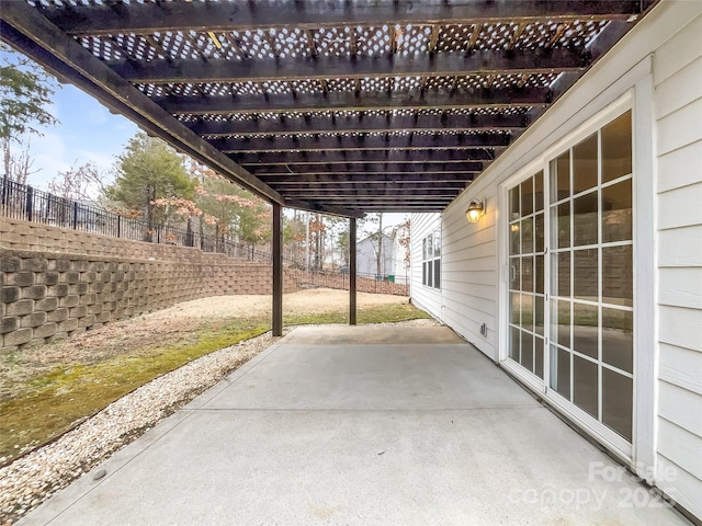 view of patio / terrace with a fenced backyard and a pergola