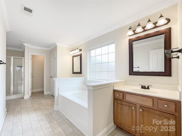 bathroom with vanity, visible vents, a stall shower, crown molding, and a garden tub