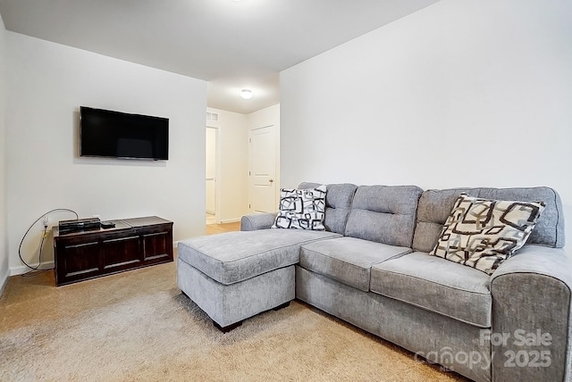 living room featuring light colored carpet