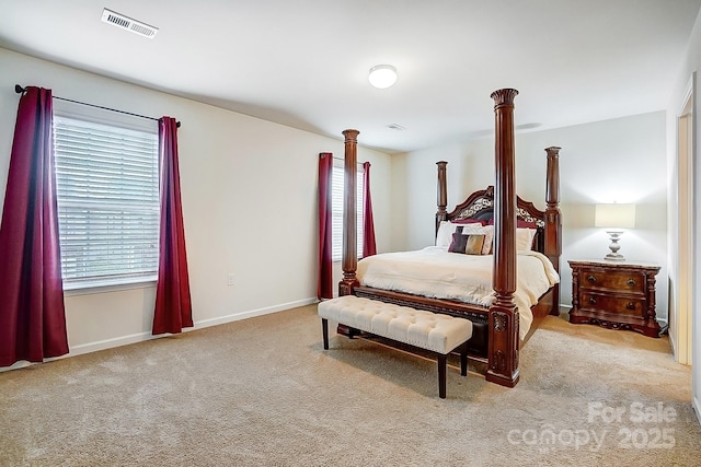 bedroom with visible vents, baseboards, and carpet floors