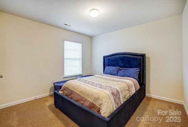 bedroom featuring carpet, visible vents, and baseboards