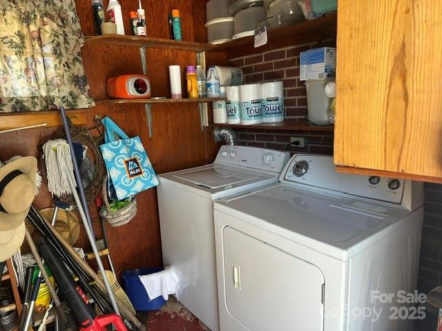 laundry room featuring laundry area and separate washer and dryer