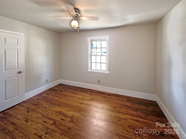 unfurnished room with ceiling fan, baseboards, and wood-type flooring