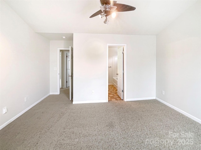 unfurnished bedroom with carpet flooring, baseboards, and ceiling fan