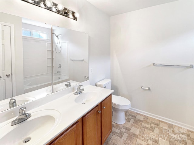 full bathroom featuring shower / washtub combination, toilet, and a sink