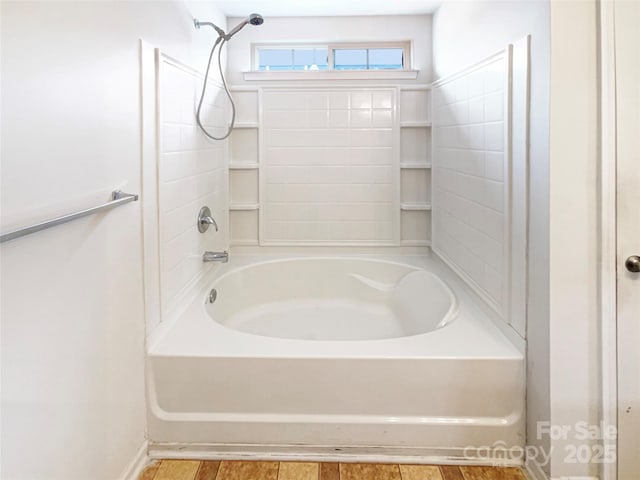 bathroom featuring washtub / shower combination