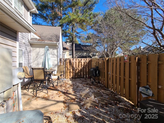 view of patio with fence