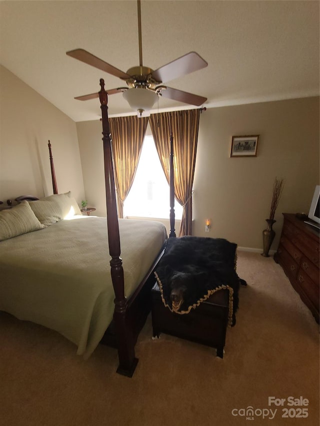 bedroom with carpet floors and a ceiling fan