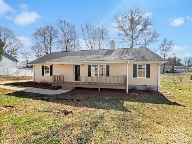 back of property featuring fence, a wooden deck, a chimney, a yard, and crawl space