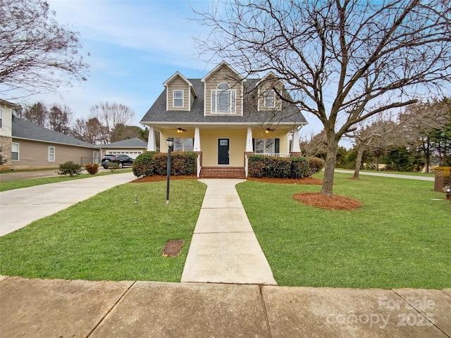 view of front of house with brick siding, covered porch, a shingled roof, and a front lawn