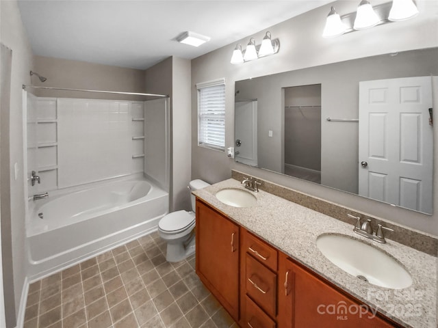 full bathroom with double vanity, toilet,  shower combination, and a sink