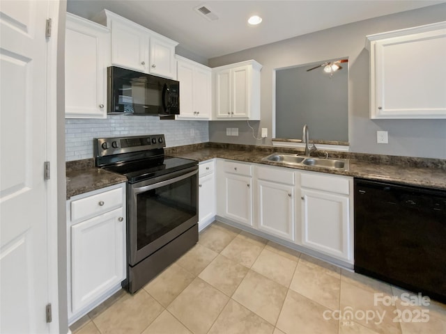 kitchen featuring dark countertops, visible vents, black appliances, white cabinetry, and a sink