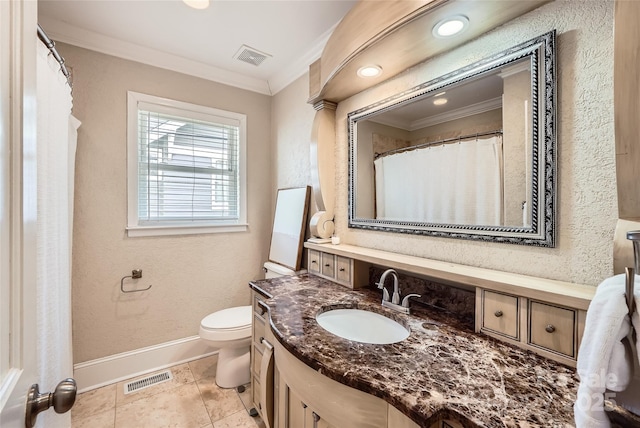 full bath with vanity, baseboards, visible vents, crown molding, and toilet