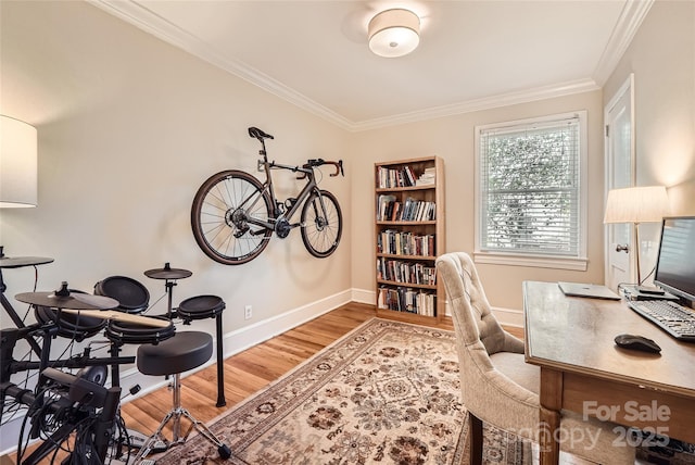 office with crown molding, baseboards, and wood finished floors