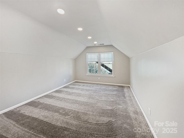 bonus room with visible vents, baseboards, lofted ceiling, carpet floors, and recessed lighting