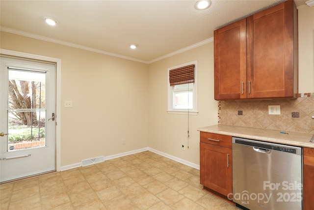 kitchen with brown cabinetry, visible vents, dishwasher, crown molding, and backsplash