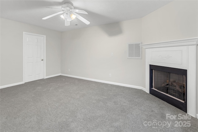 unfurnished living room featuring a fireplace, visible vents, carpet floors, and baseboards