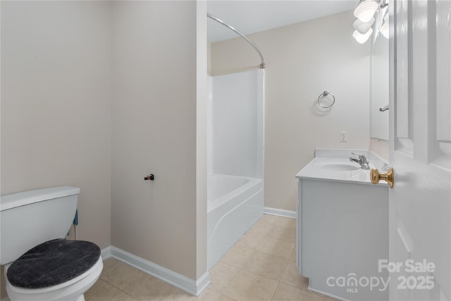 full bath with vanity, toilet, baseboards, and tile patterned flooring