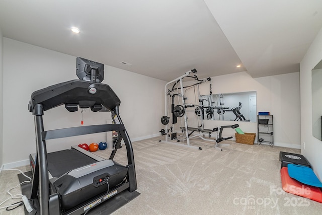 workout area featuring recessed lighting, baseboards, and carpet floors