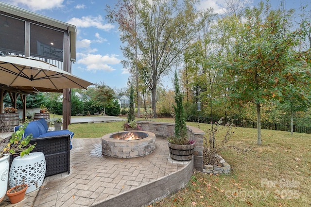 view of patio / terrace featuring a fire pit