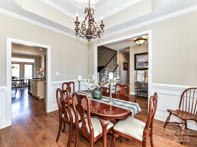 816 Springs Rd, Dallas, NC 28034 - dining area featuring a chandelier, dark wood finished floors, stairway, crown molding, and wainscoting