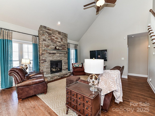 816 Springs Rd, Dallas, NC 28034 - living area featuring high vaulted ceiling, ceiling fan, wood finished floors, baseboards, and a fireplace