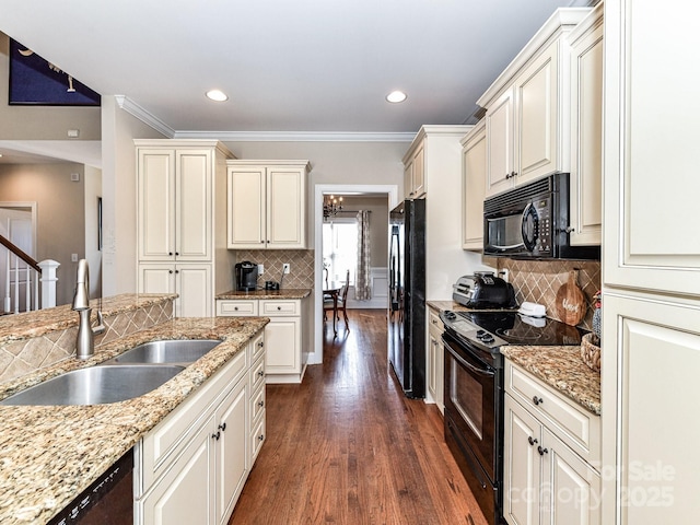 816 Springs Rd, Dallas, NC 28034 - kitchen featuring black appliances, a sink, crown molding, dark wood-type flooring, and light stone countertops