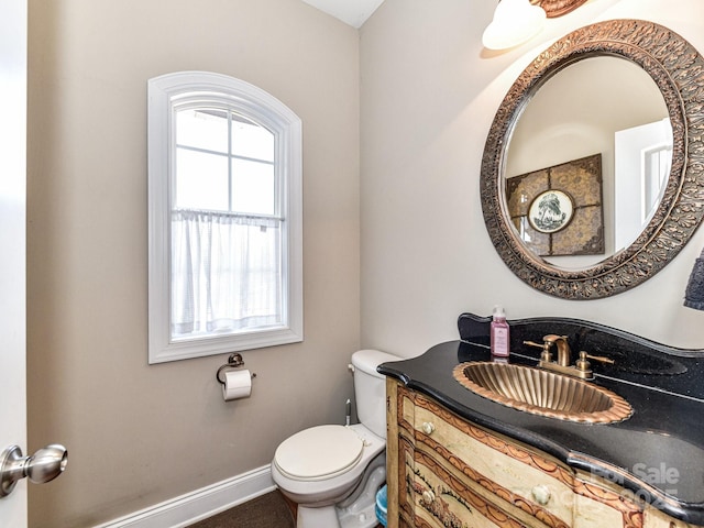 816 Springs Rd, Dallas, NC 28034 - bathroom featuring toilet, vanity, and baseboards
