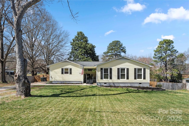 ranch-style home featuring crawl space, a front yard, and fence