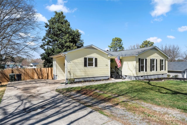 view of front of house featuring fence, driveway, entry steps, a front lawn, and crawl space