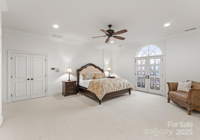 bedroom with crown molding, recessed lighting, visible vents, and carpet floors