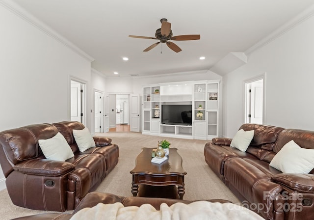 living area with recessed lighting, a ceiling fan, carpet, and ornamental molding