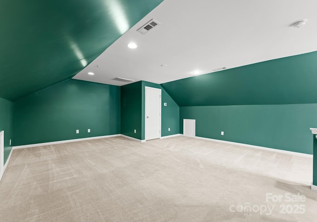 bonus room featuring visible vents, recessed lighting, carpet, and baseboards