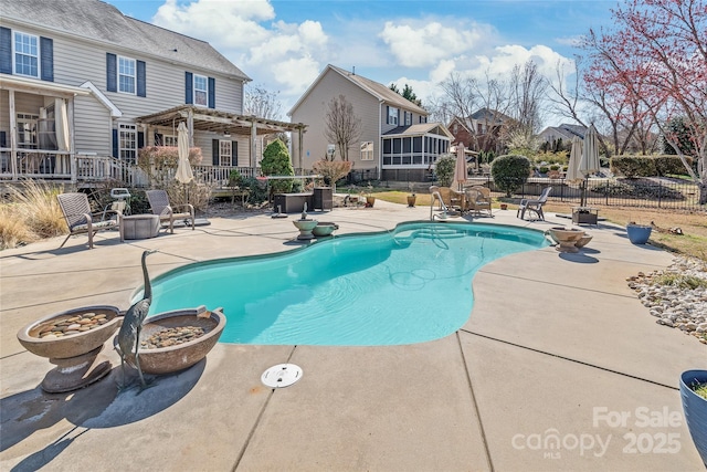 view of pool featuring a patio area, a fenced in pool, and fence