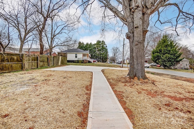 view of yard with fence