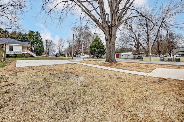 view of yard featuring a residential view