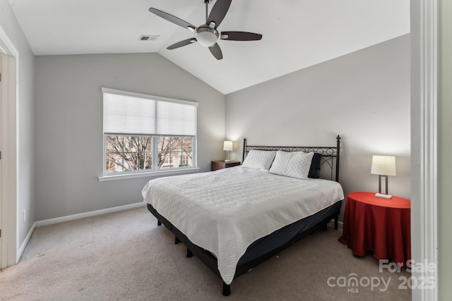 bedroom featuring visible vents, a ceiling fan, carpet, baseboards, and vaulted ceiling