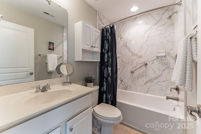 full bathroom featuring visible vents, toilet, shower / bath combo, and vanity