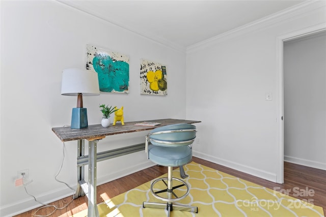 home office with baseboards, wood finished floors, and crown molding