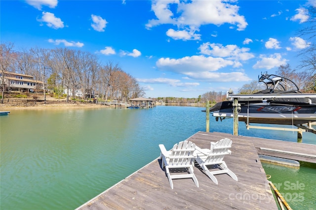 view of dock with a water view