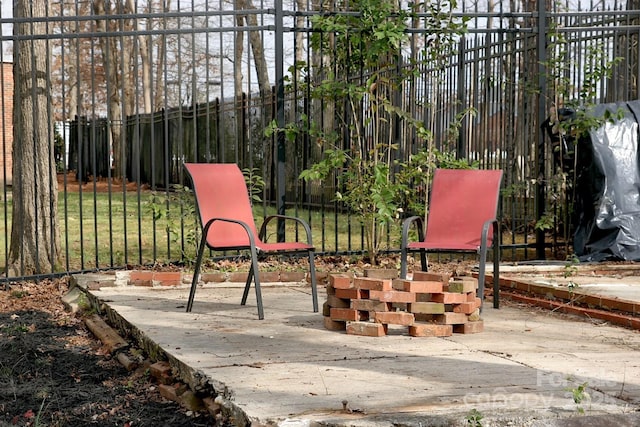 view of patio / terrace with fence