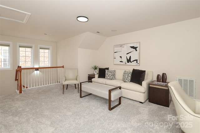 living room featuring carpet flooring and visible vents