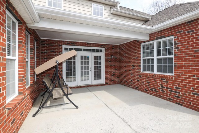 view of patio featuring french doors