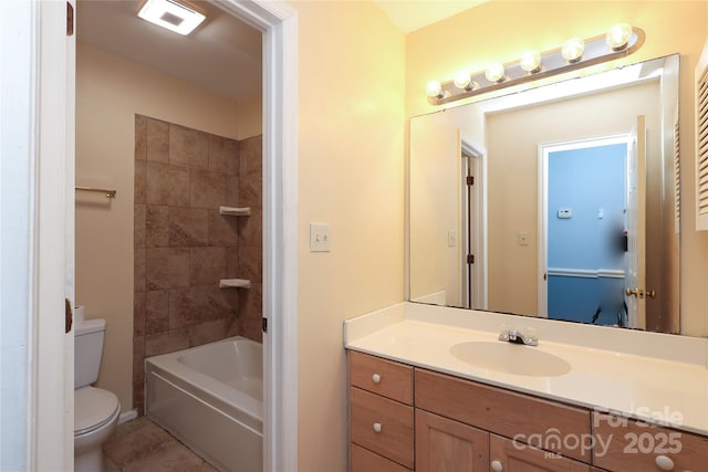 bathroom with visible vents, washtub / shower combination, toilet, tile patterned floors, and vanity