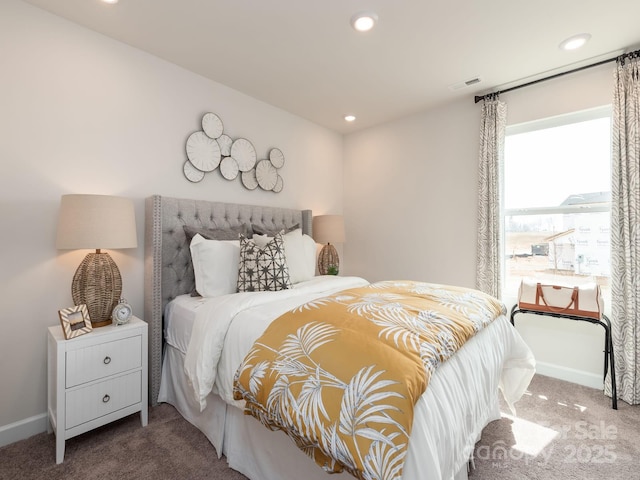 carpeted bedroom with recessed lighting, baseboards, and visible vents