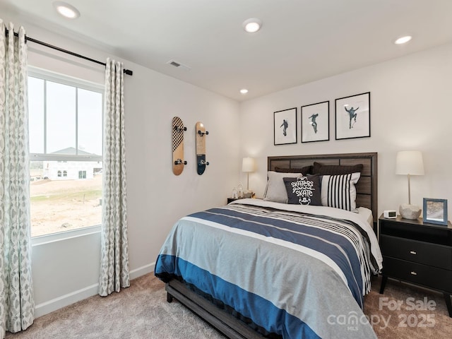 carpeted bedroom featuring visible vents, recessed lighting, and baseboards