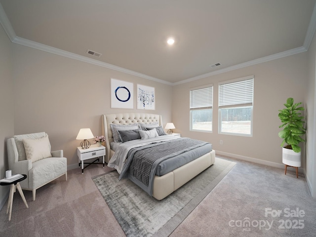 bedroom with crown molding, carpet flooring, and visible vents