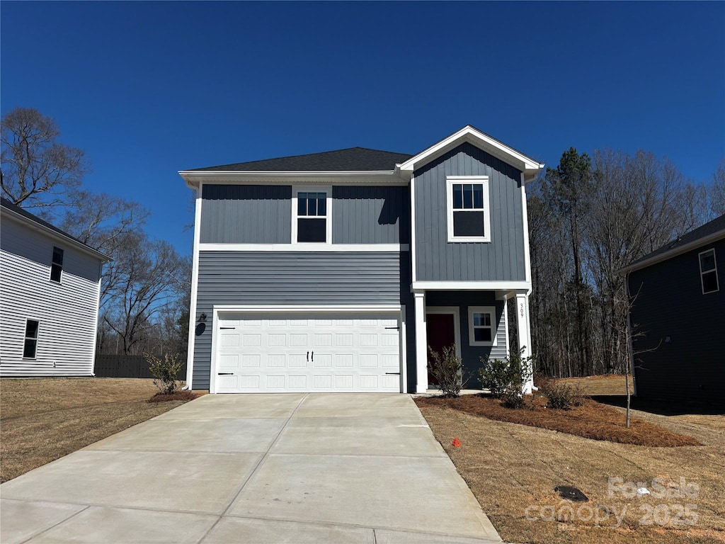 309 Alden Ct, Shelby, NC 28152 - traditional-style house with a garage, board and batten siding, and driveway