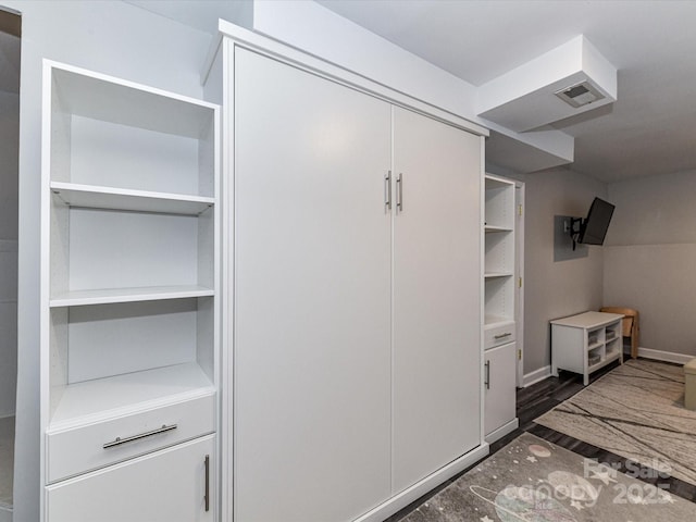 closet featuring visible vents